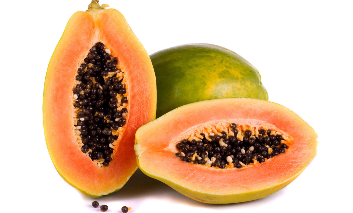 Lechosa dominicana madura, cortada y entera